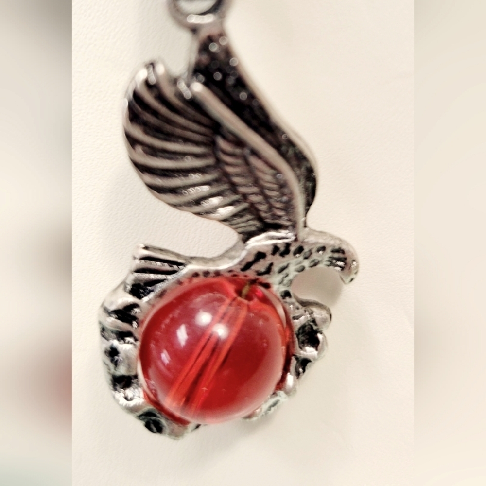 Necklace with Eagle holding a red glass orb
